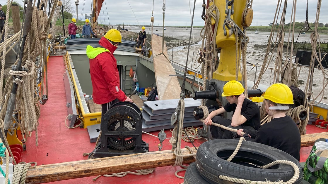 Sea-Change-Unloading-Wood